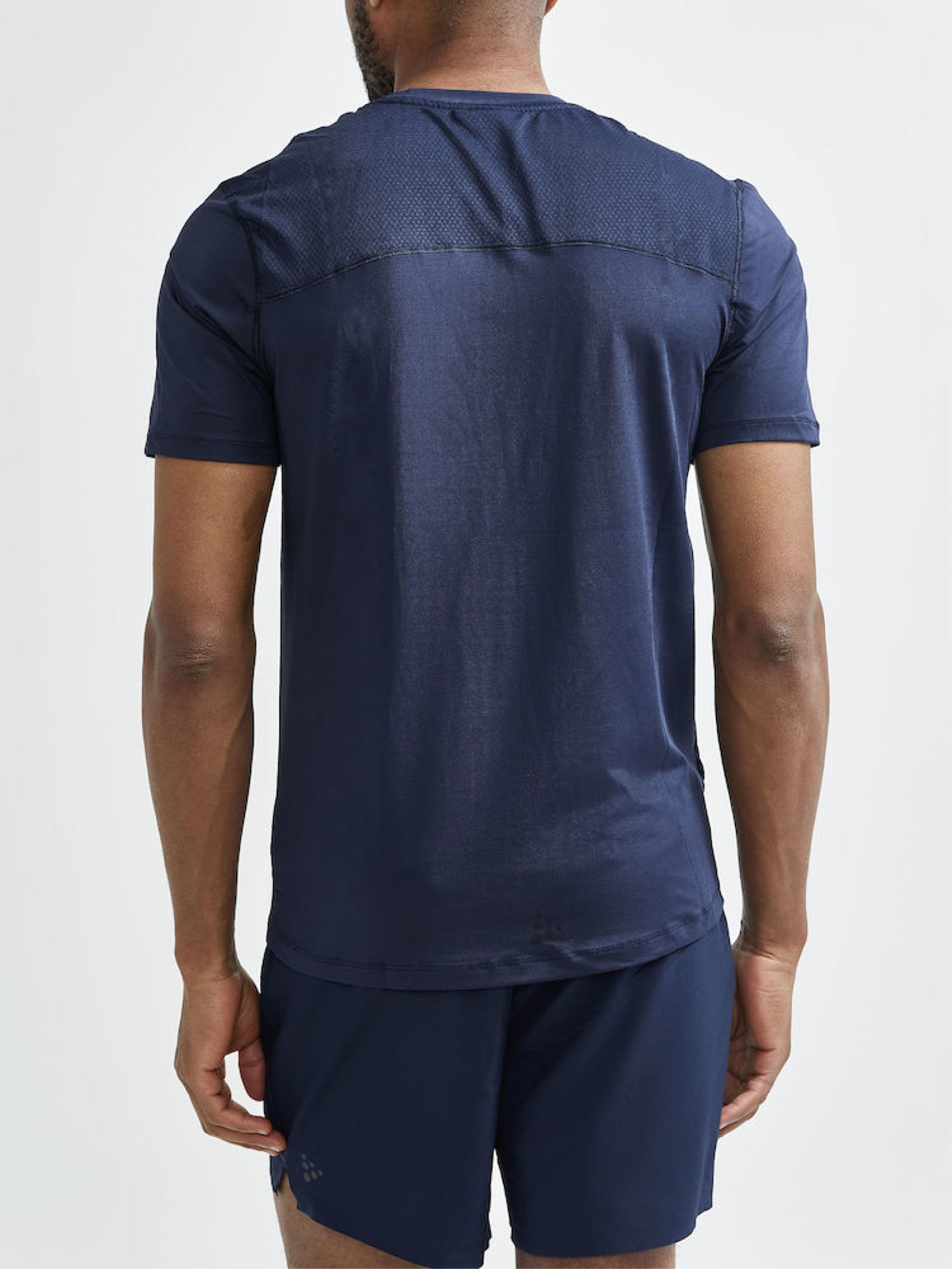 Bliv stor dialog Navy løbe t-shirt med mesh detaljer fra Craft | Køb den her!